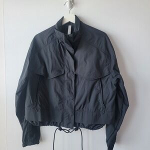 Athleta women's Canopy Parachute Jacket sz M Short Black Lightweight Windbreaker